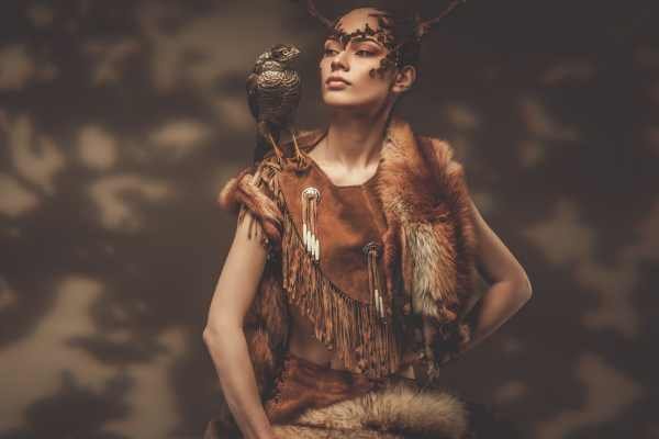 female shaman with spirit animal symbolism